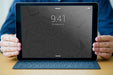 Free Tablet Mockup With Keyboard And Man Psd