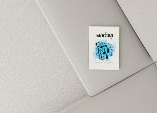 Free Top View Book Mock-Up On Sofa Psd