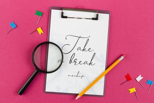 Free Top View Clipboard And Magnifying Glass Psd