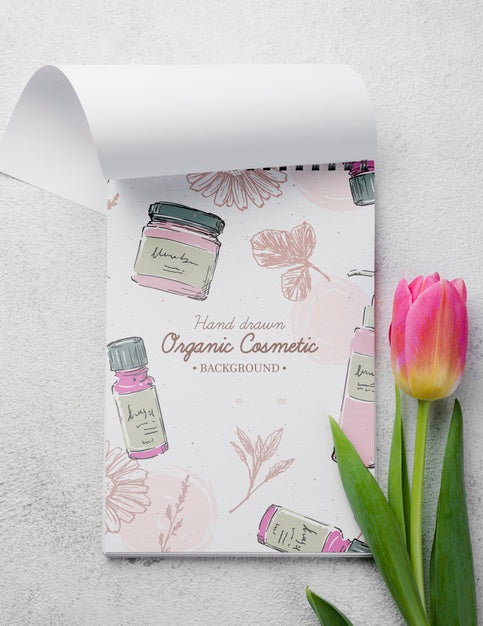 Free Top View Cosmetics Mockup With Flowers Psd