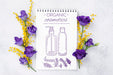 Free Top View Cosmetics Mockup With Flowers Psd