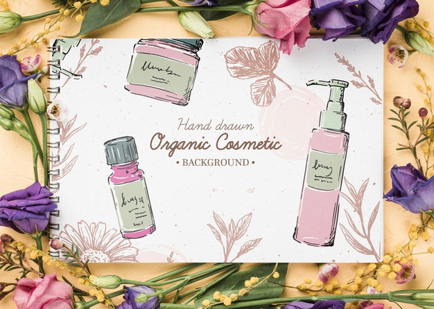 Free Top View Cosmetics Mockup With Flowers Psd