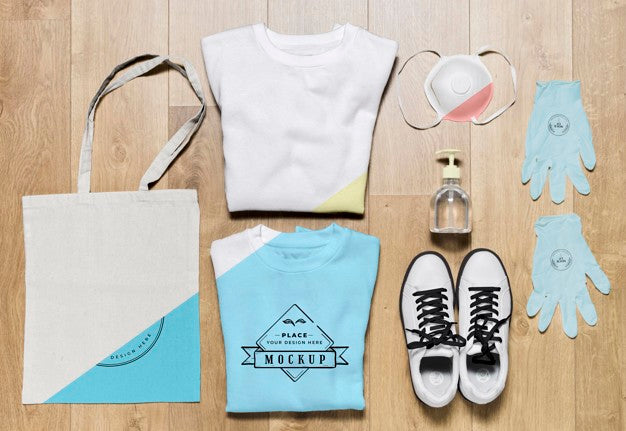Free Top View Folded Hoodies Mock-Up With Bag And Shoes Psd