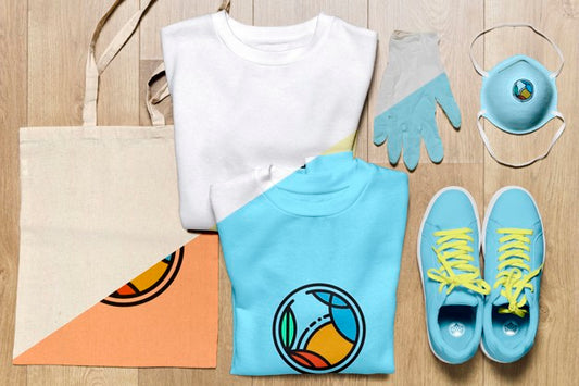Free Top View Folded Hoodies Mock-Up With Shoes And Bag Psd