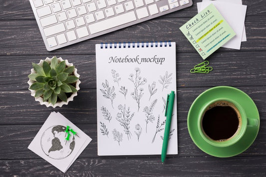 Free Top View Notebook Mock-Up And Stationery Near Coffee And Succulent Plant Psd