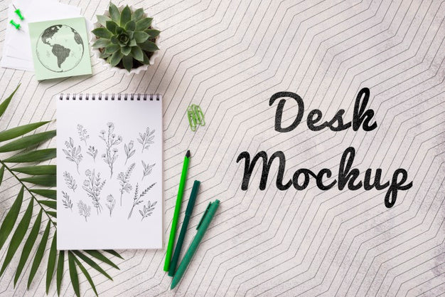 Free Top View Notebook Mock-Up And Stationery Near Plant Psd