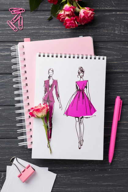 Free Top View Notebook Mock-Up And Stationery Near Roses Psd