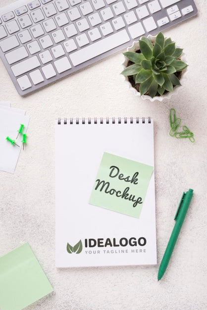 Free Top View Notebook Mock-Up And Stationery Near Succulent Plant And Keyboard Psd