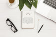 Free Top View Notebook With Eyeglasses And Laptop Psd