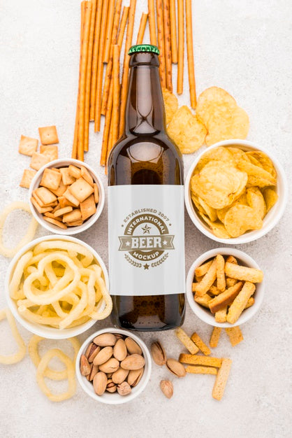 Free Top View Of Beer Bottle With Assortment Of Snacks Psd