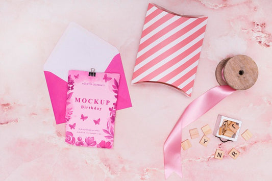 Free Top View Of Birthday Gift Mock-Up With Card And Envelope Psd
