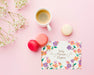 Free Top View Of Card With Macarons And Coffee Cup Psd