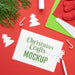 Free Top View Of Christmas Crafts With Paper And Branch Psd