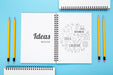 Free Top View Of Desk Surface With Notebooks And Pencils Psd
