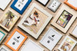 Free Top View Of Different Shaped Frames On Wooden Background Psd
