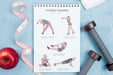 Free Top View Of Fitness Notebook With Apple And Weights Psd