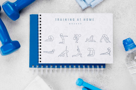 Free Top View Of Fitness Notebook With Weights And Water Bottle Psd
