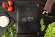 Free Top View Of Menu With Tomatoes And Cutlery Psd