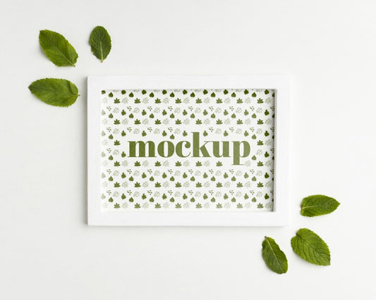 Free Top View Of Mock-Up Frame Design With Leafage Psd