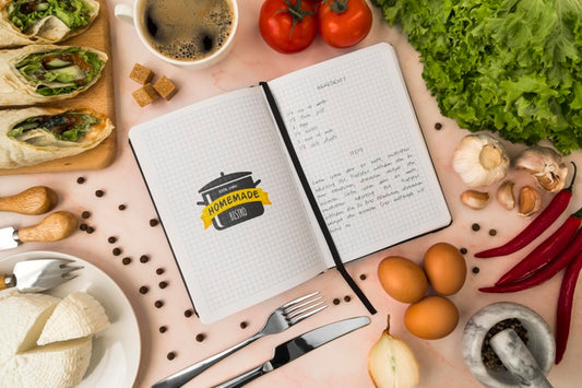 Free Top View Of Recipe Book With Ingredients And Cheese Psd