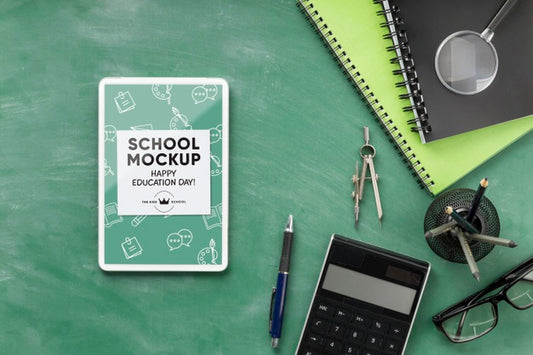 Free Top View Of School Essentials For Education Day With Tablet And Calculator Psd