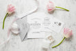 Free Top View Of Wedding Cards With Envelope And Flowers Psd