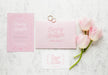 Free Top View Of Wedding Cards With Rings And Flowers Psd
