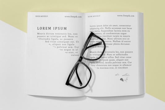 Free Top View Open Book Mock-Up With Glasses Psd