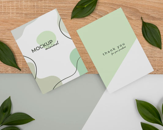 Free Top View Stationery Leaves And Wooden Piece Psd