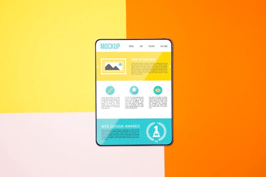 Free Top View Tablet On Colorful Background Psd