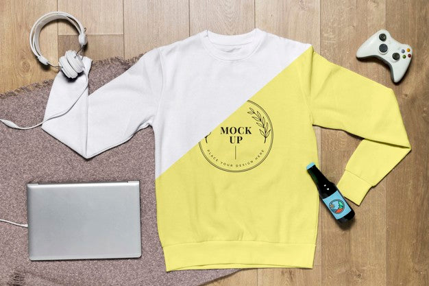 Free Top View Yellow Hoodie Mock-Up With Gadget And Bottle Psd
