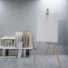 Free White Canvas On A Easel At The Art Room Psd