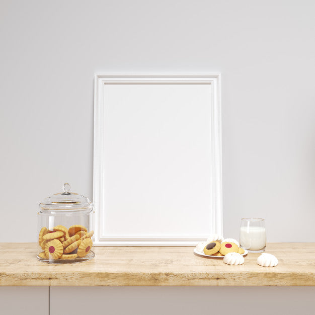 Free White Frame Mockup On A Kitchen Counter With Delicious Cookies Psd