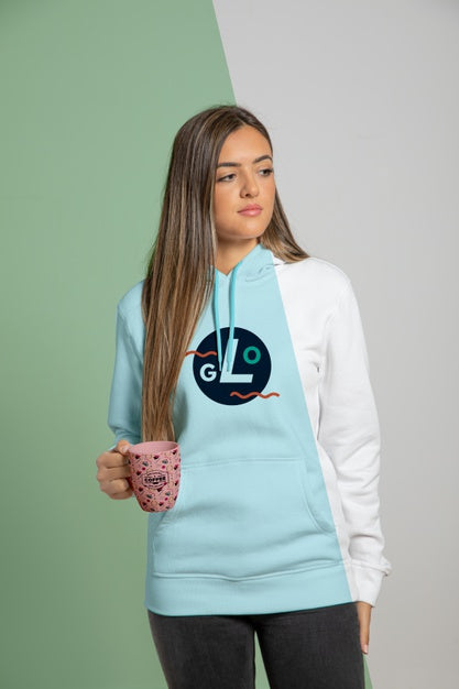 Free Woman Dressed In Hoodie Holding Mug Psd