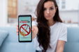 Free Woman Holding A Smartphone Mock-Up Psd