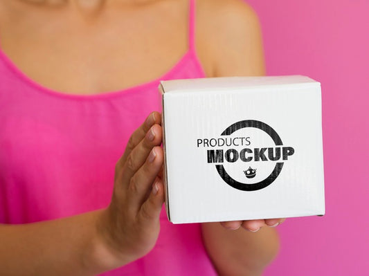 Free Woman Holding Box Mock-Up Psd