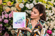 Free Woman Holding Tablet Mockup For Spring Sale Psd