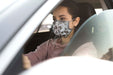 Free Woman In Car Wearing Mask Psd