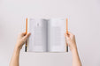 Free Woman With Book Mockup Psd