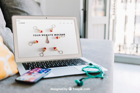 Free Workspace Composition With Smartphone On Laptop Psd