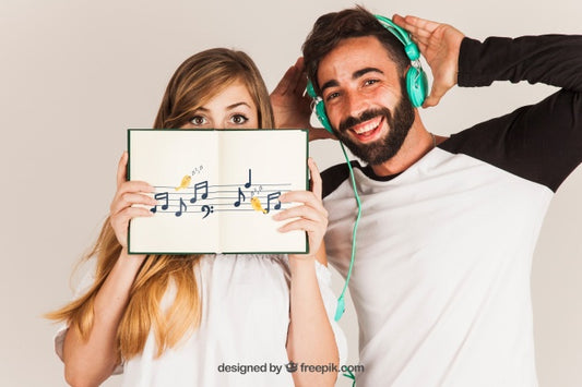 Free Young Couple Showing Book Psd